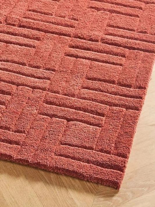 Red hand tufted carpet