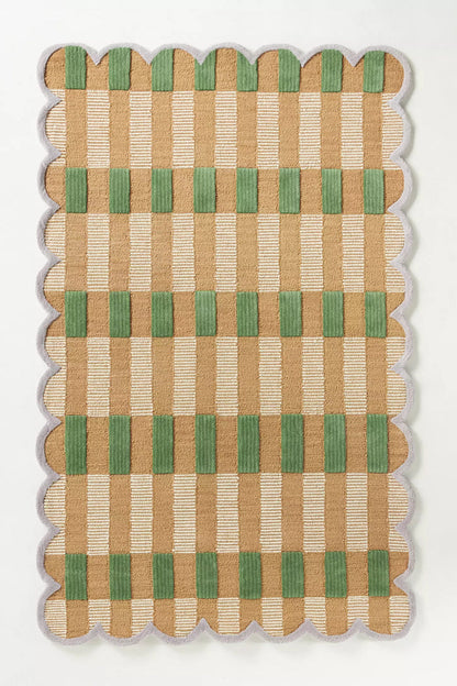 Woven mat with a checkered pattern of green and beige on a white background