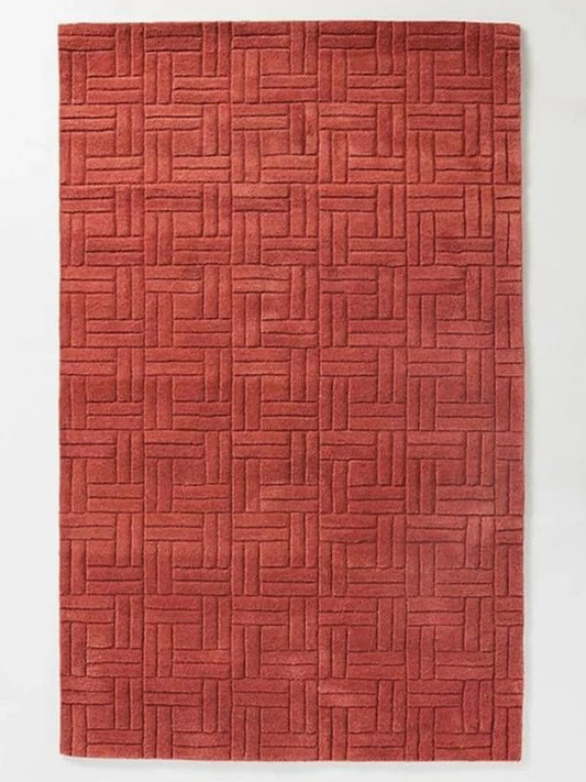 Red hand tufted carpet